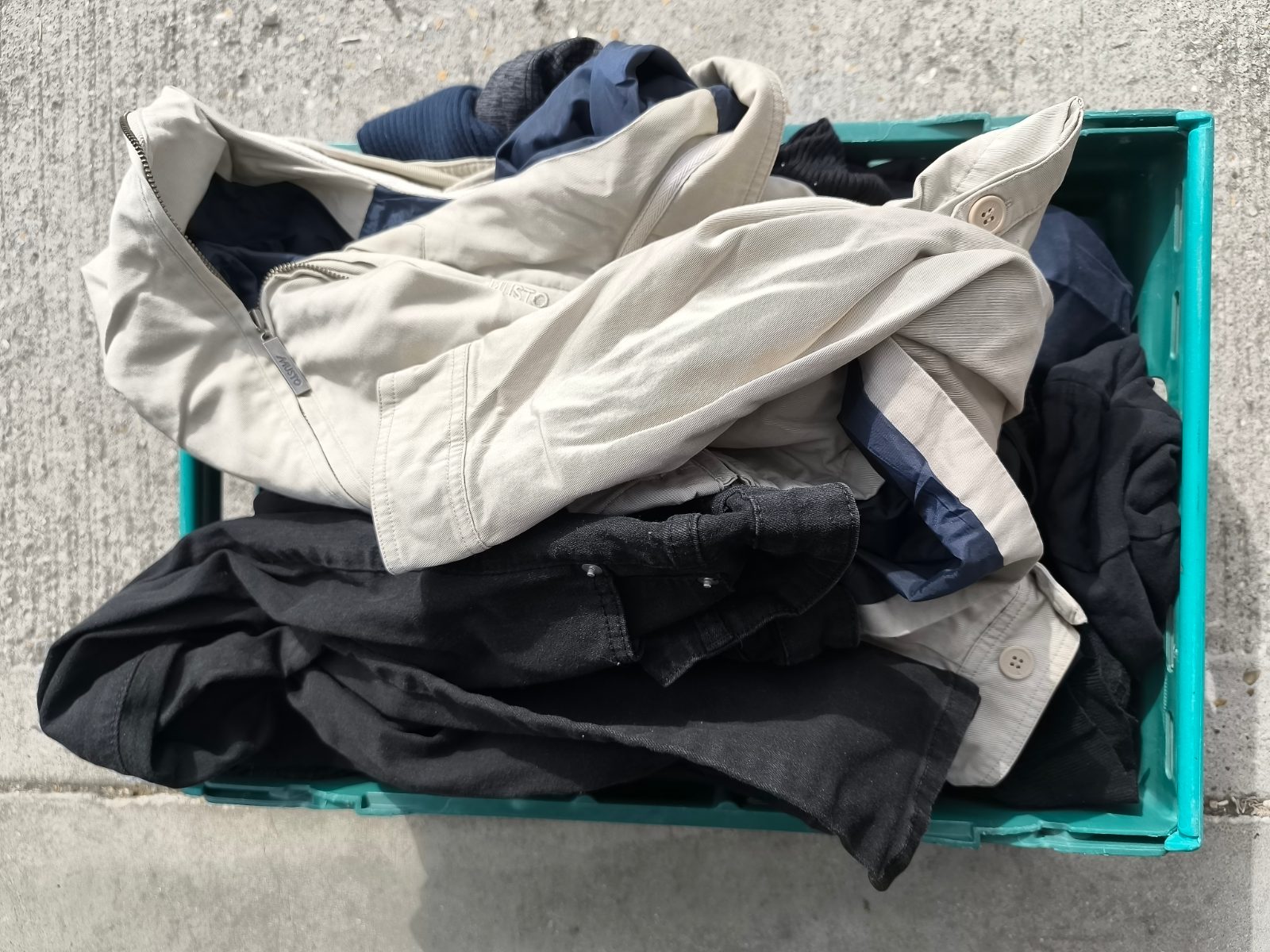 Crate of used clothes